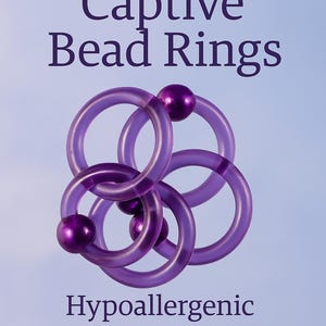 May include: UV purple captive bead rings. The image shows several translucent purple rings with a small, round bead at the closure. The text on the image says the rings are hypoallergenic, flexible, lightweight, and MRI-safe.