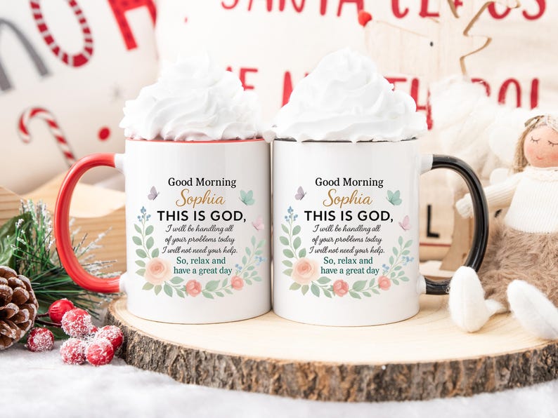 Two personalized Christian coffee mugs with floral designs and 'Good Morning Sophia' text; red and black handles.