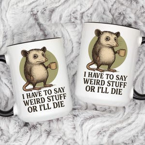 Funny possum mug featuring a cartoon possum holding a cup with a weird stuff quote; quirky office humor mug, coworker gift.
