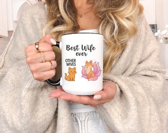 Tazza da caffè "Miglior moglie" con design di confronto divertente, simpatica tazza di apprezzamento per la moglie per l'anniversario, umorismo romantico per il partner, uso quotidiano del caffè