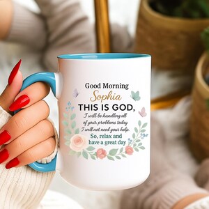 Personalized Christian coffee mug with turquoise handle and interior, white body, floral wreath, good morning Bible verse text.