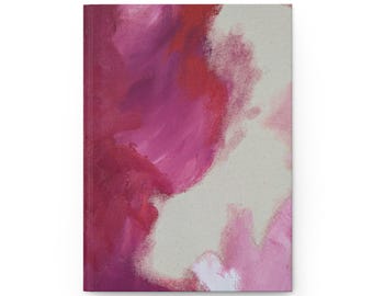 Diário de capa dura rosa com estampa abstrata