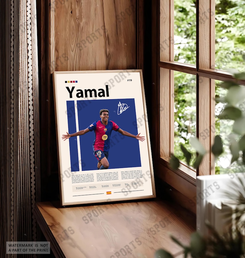 May include: A framed vertical poster featuring a graphic illustration of soccer player Lamine Yamal in a red and blue jersey with the number 19. The design includes the name Yamal, a signature, biographical text, and a small Spanish flag at the bottom.