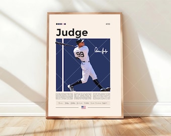 May include: A framed poster featuring a baseball player in a white pinstriped uniform with the number 99, swinging a bat. The design includes the text Judge, a signature, and statistical data blocks on a cream background with a dark blue central panel.