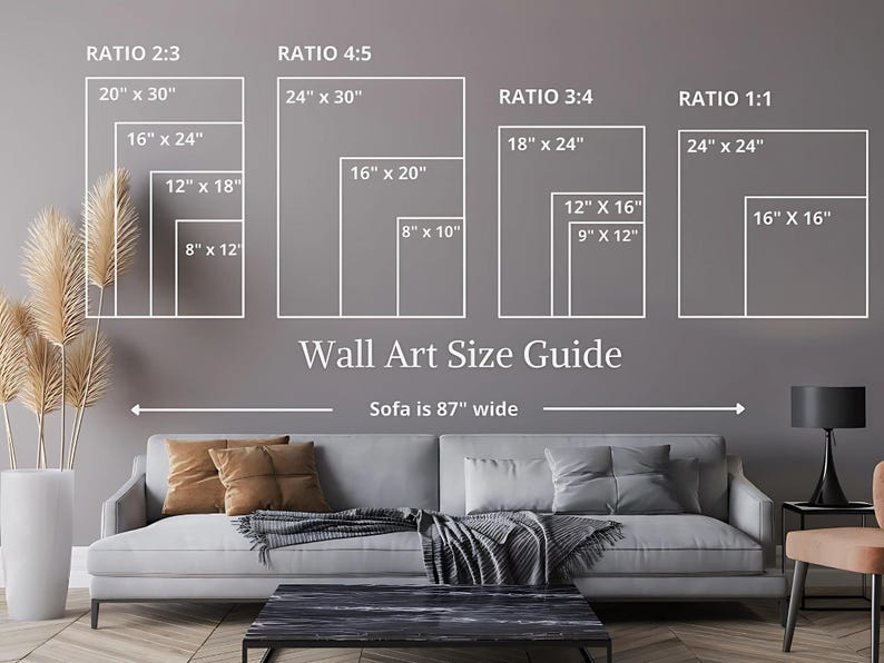 May include: A Wall Art Size Guide chart displaying various frame ratios and dimensions in inches, including 2:3, 4:5, 3:4, and 1:1. The graphic shows sizes ranging from 8x10 to 24x30 inches, positioned above a sofa labeled as 87 inches wide.