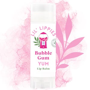 May include: A pink and white lip balm tube with the text "Lil' Lippies" and "Bubble Gum Yum Lip Balm" on the front. The tube features a cartoon illustration of a pink gumball machine.
