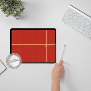 Könnte beinhalten: Ein rotes digitales Tablet mit einem goldenen Schleifendesign und einem kleinen Tupfenmuster. Das Tablet trägt den Text "INSTANTLY DOWNLOAD!" auf einem silbernen Abzeichen. Eine Tastatur und ein Stift sind ebenfalls sichtbar.