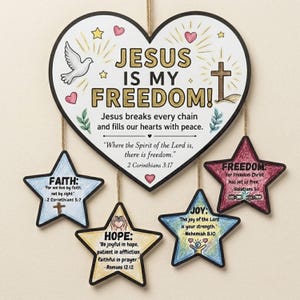 May include: A heart-shaped wall hanging with the text JESUS IS MY FREEDOM! and four smaller star-shaped ornaments hanging below. Each piece features religious text, illustrations of a dove, cross, and hearts, with colored pencil-style accents.
