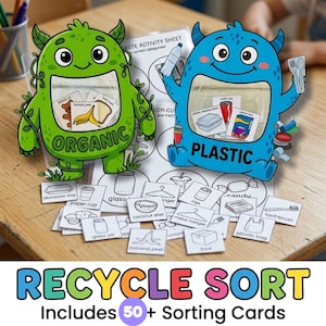 May include: Educational recycle sorting game featuring two cartoon monster characters labeled "Organic" and "Plastic." Includes sorting cards with various waste items. The text "Recycle Sort" and "Includes 50+ Sorting Cards" are also visible.