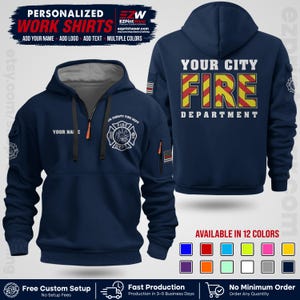 May include: A navy blue quarter-zip hoodie featuring a grey hood lining and black drawstrings. The front displays a fire department emblem and the text YOUR NAME. The back features the text YOUR CITY FIRE DEPARTMENT with red and yellow stripes.