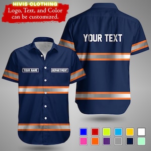 May include: Dark blue short-sleeved work shirt with orange and silver reflective stripes. The shirt features the text "YOUR NAME" and "DEPARTMENT" on the front, and "YOUR TEXT" on the back. The text "HIVIS CLOTHING" is also visible.