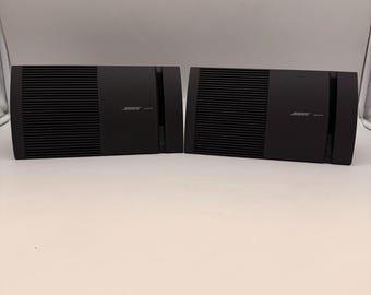 Par de altavoces Bose Modelo 100 de reflexión directa, estilo vintage, fabricados en EE. UU. en la década de 1980.