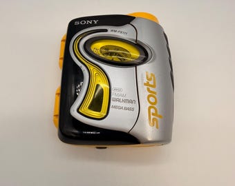 Reproductor de casetes Sony Sports Walkman WM-FS111 vintage, probado y en funcionamiento, radio FM/AM, años 90.