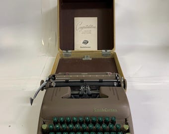 Vintage Smith Corona Silent Portable Typewriter with Case and Manual