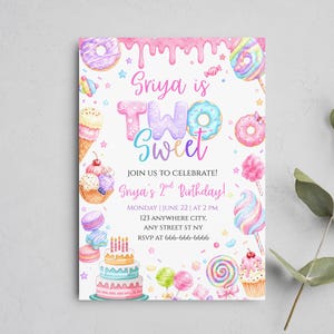 May include: A vibrant birthday invitation with a watercolour design. It features illustrations of sweets, including donuts, lollipops, and a cake. The text reads "Sriya is TWO Sweet" with party details.