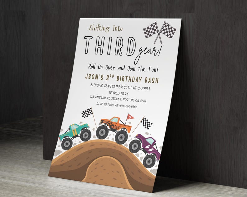 May include: A white invitation card with the text "Shifting Into THIRD gear!" and "JASON'S 3rd BIRTHDAY BASH". The card features illustrations of monster trucks in teal, orange, and purple, racing on a dirt track, with checkered flags.