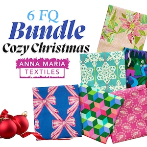 May include: A bundle of six folded fabric squares by Anna Maria Textiles labeled 6 FQ Bundle Cozy Christmas. The patterns include poinsettias, snowflakes, a winter landscape, blue bows, geometric cubes, and pink floral motifs, with two red ornaments.