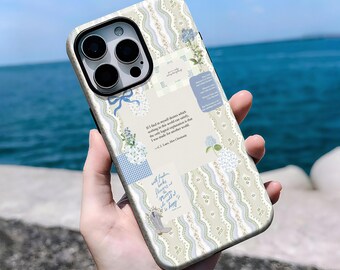 May include: A decorative phone case featuring a patchwork design with floral and lace patterns in pastel colors. The case includes text from a quote and a small illustration of a boot. The case is designed for a smartphone.