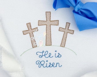 Diseño de bordado a máquina con puntada de boceto de cruces en la colina