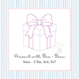 May include: A line drawing of a gift box topped with a bow. The box is rectangular with vertical lines. The bow is large and detailed. Text at the bottom reads "Present with Bow - Bean" and lists sizes 6.35cm, 10.16cm x 10.16cm, and 12.7cm x 17.78cm.