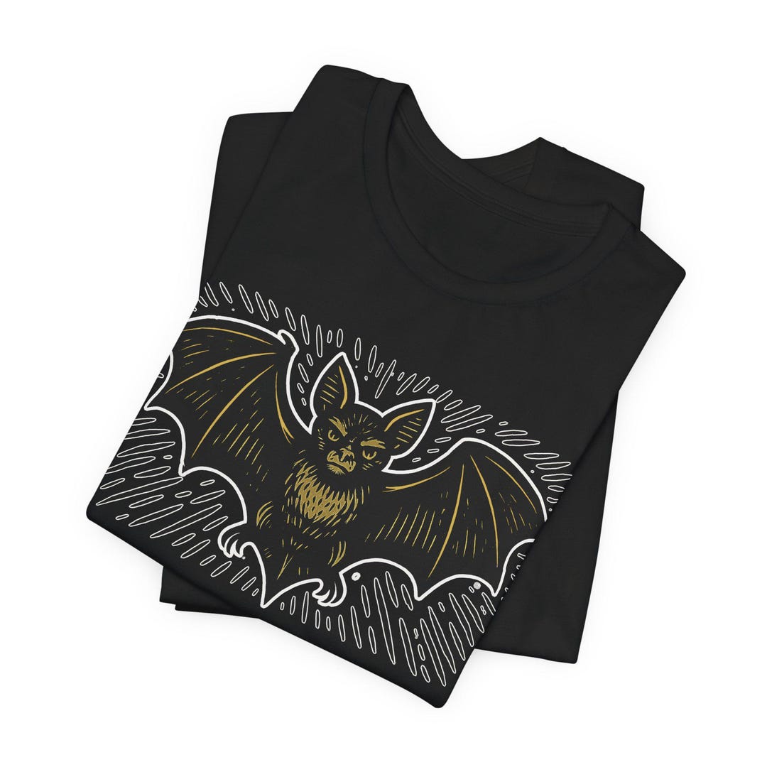 Step Out and Make a Statement With This Unique Bat Graphic Tee - a ...