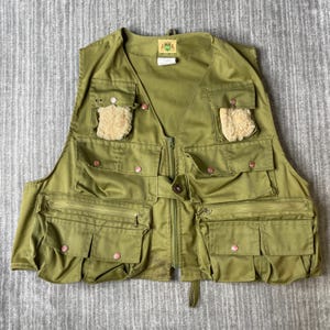 Vintage Ideal vliegvisvest uit de jaren 70 – XL 46-48 – Gemaakt in de VS, olijfgroen, multifunctioneel vest met schapenvacht en Gorpcore-print.