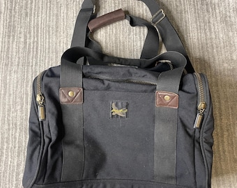 Bolsa de lona Eddie Bauer vintage de los años 90 – Nylon negro, bolsa de viaje para fin de semana, bolsa de gimnasio, ribete de cuero.