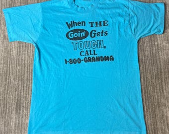 Vintage 1990s BEST Graphic T-Shirt – L – 1-800-Grandma Funny Slogan – Turquoise Novelty Single Stitch Style Tee