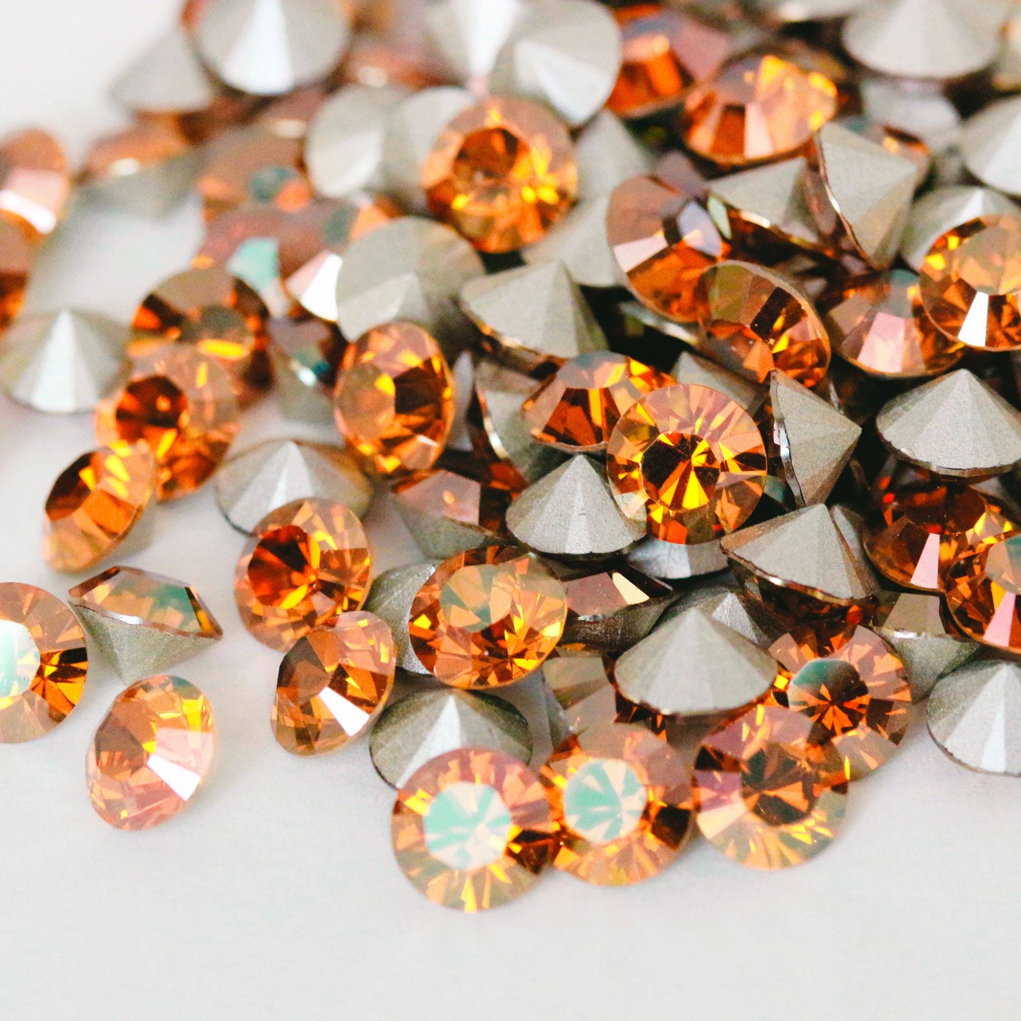 Swarovski 1028 Crystal Copper 001COP XIRIUS Chaton Pointed Back