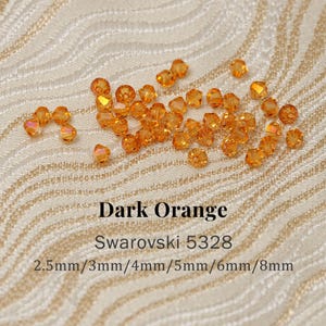 Swarovski 5328 Dark Orange 1202 Xilion Bicone Beads, Genuine
