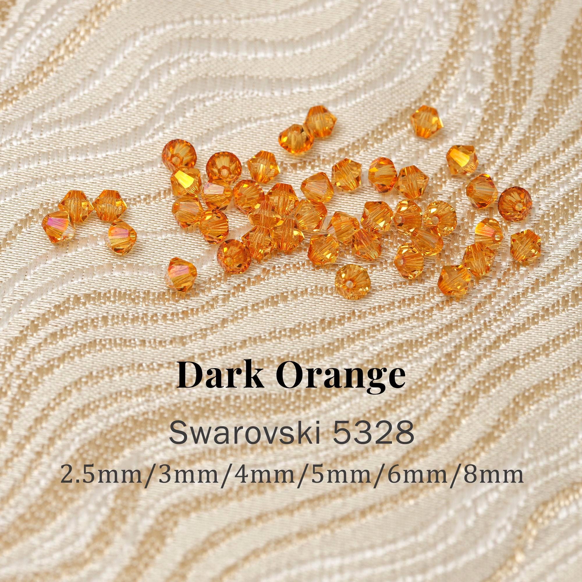 Swarovski 5328 Dark Orange 1202 Xilion Bicone Beads, Genuine