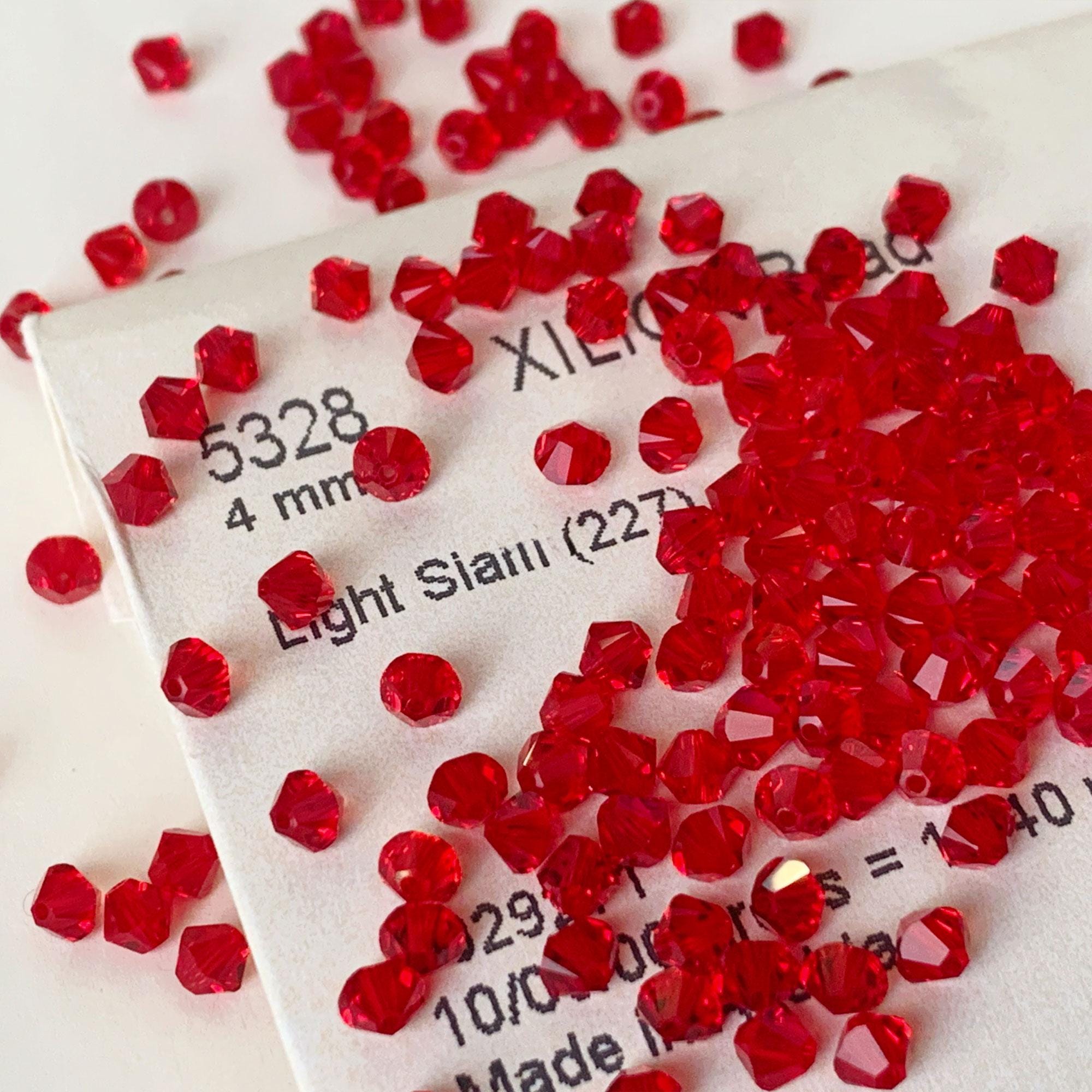 Swarovski 5328 Light Siam 227 Series Xilion Bicone Beads • AB, Shimmer ...