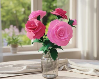 Ingemaakt vilten arrangement met roze roos