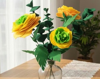 Composizione di fiori di ranuncolo in feltro in vaso