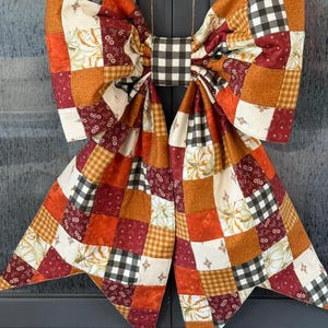 Patchwork quilted bow 18"w x 25"h