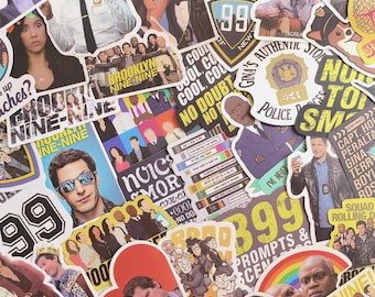 May include: A collection of colorful stickers featuring characters and logos from the television show Brooklyn Nine-Nine. The stickers include images of the cast, the precinct logo, and various quotes and phrases from the show.