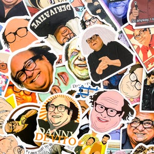 May include: A collection of colorful stickers featuring various images of Danny DeVito. The stickers showcase different portraits and poses, some with text like "DANNY DEVITO" and "DERIVATIVE". The stickers are of various shapes and sizes.