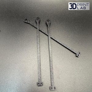 May include: Three textured, dark gray 3D-printed tie rods with a loop at one end and a decorative base at the other. One rod is angled across the others. The logo "3D PRINT LAB" is in the upper right corner.