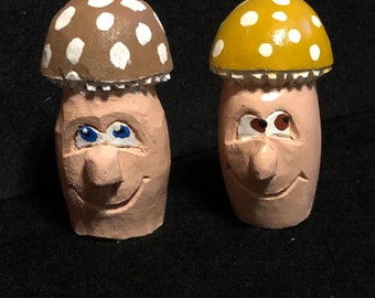 Mr and Mrs Mushroom, carved caricature