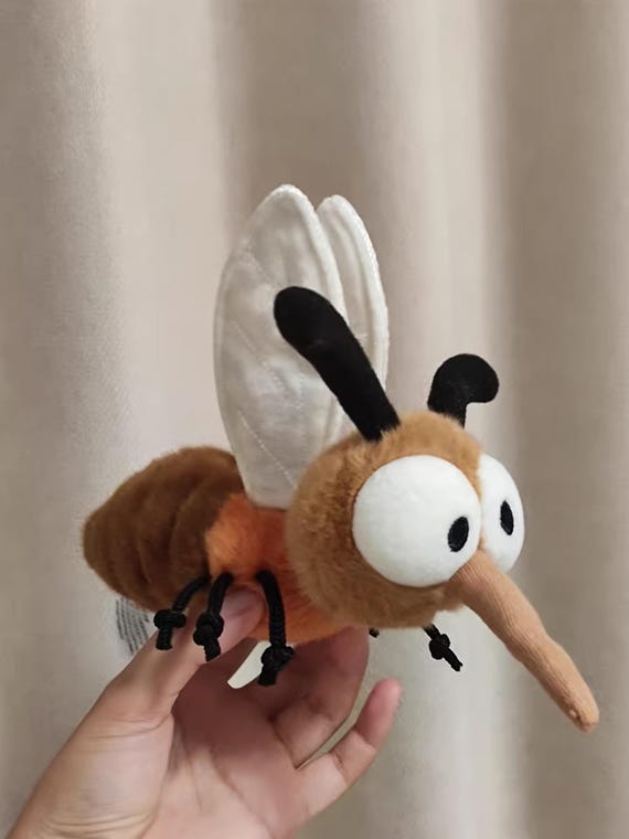Peluche Moustique 25 Cm – Jouet Ultra Doux Et Décoratif, Original Pour Chambre, Bureau Ou Collection, Cadeau Fille Ou Ami