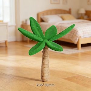 May include: A decorative palm tree with a green, textured leaf design and a brown trunk. The dimensions are 235mm x 30mm. The leaves are a vibrant green, and the trunk has a textured, natural appearance. This item is suitable for home decor.