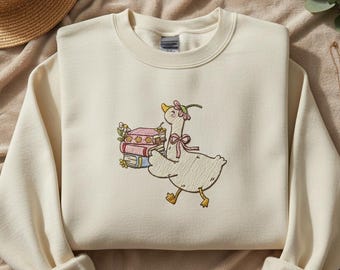 Lindo archivo de bordado de ganso con libros, diseño de ganso lector, patrón de bordado a máquina para amantes de los libros