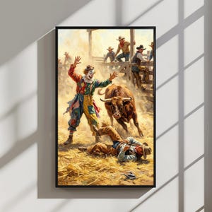 May include: A framed painting depicts a rodeo scene with a clown, a bull, and cowboys. The clown, in colorful attire, stands with arms raised. A cowboy lies on the ground, while others watch from a wooden fence. The bull charges forward in a cloud of dust.