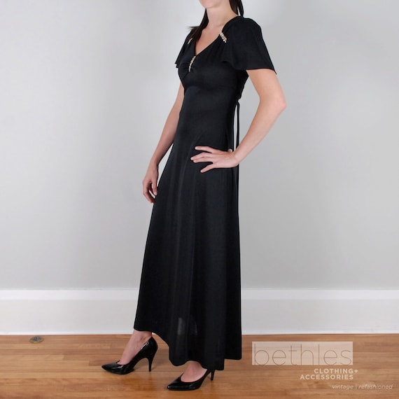 black flutter sleeve maxi dress