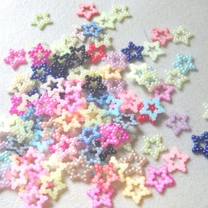 Cuentas planas de estrella de perla - Colores surtidos - 12 mm - 50 piezas