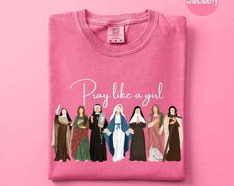 Comfort Colors® Catholic Saint T-Shirt, Pray Like A Girl Christian Shirt, Gift for Women, Faith Inspired Shirt, Cute Faith Marian Shirt