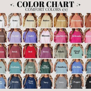 May include: A color chart displays a variety of Comfort Colors t-shirts in various shades. The chart includes colors like white, ivory, banana, butter, mustard, terracotta, yam, espresso, orchid, violet, and many more. The text "COLOR CHART COMFORT COLORS 1717" is at the top.