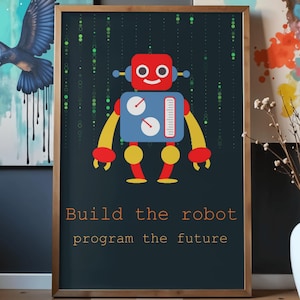 May include: Framed art print featuring a cartoon robot with a red head, blue body, and yellow arms and legs. The robot is set against a dark blue background with green lines. Text at the bottom reads "Build the robot program the future."
