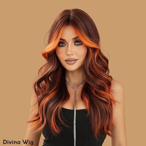 May include: A long, wavy wig with dark brown hair and bright orange highlights. The wig has a natural hairline and is styled with loose curls. The text "Divina Wig" is visible at the bottom left of the image.