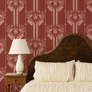 May include: A bedroom with a dark wooden bed frame and headboard, dressed with a cream-coloured duvet and pillows. Two white lamps sit on matching bedside tables. The wall is decorated with a red floral pattern, creating a classic aesthetic.